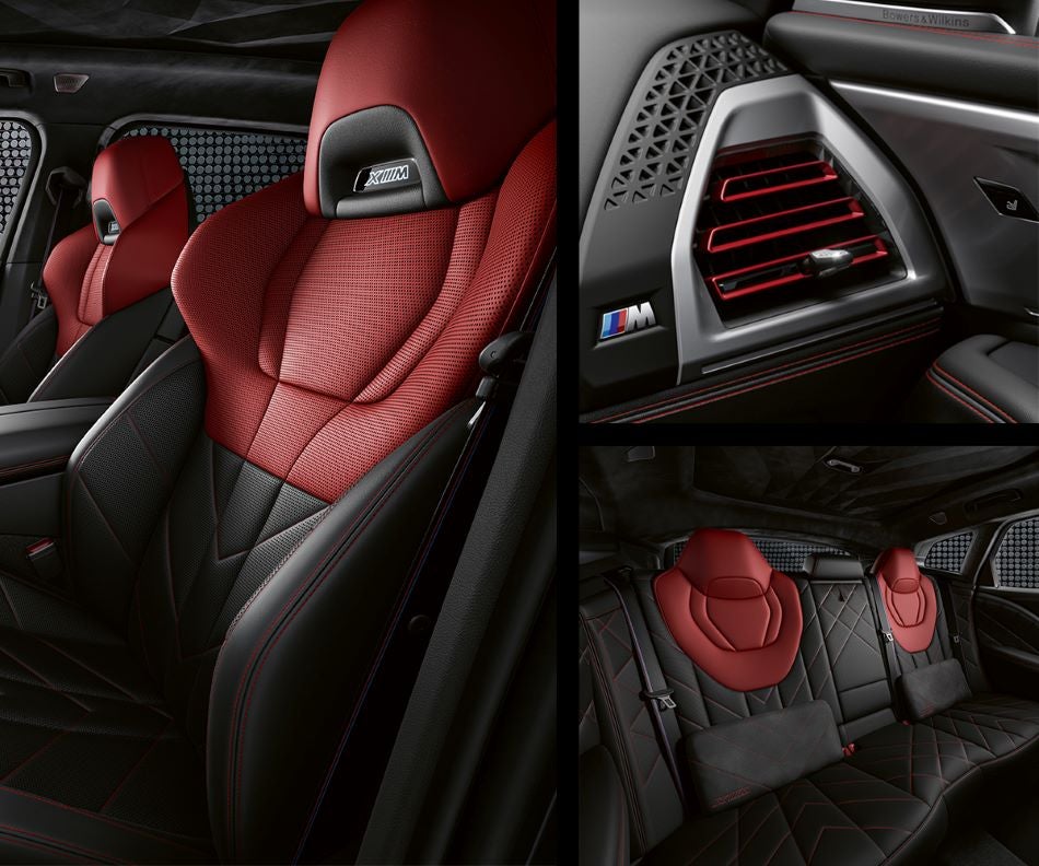 Detail of front seats, clad in exclusive BMW Individual Fiona Red & Black Merino Leather with exclusive M Signature Trim and red stitching and accents. Detail of red accented vent. Detail of rear M Lounge with exclusive XM pillows in BMW of Bakersfield | Bakersfield CA
